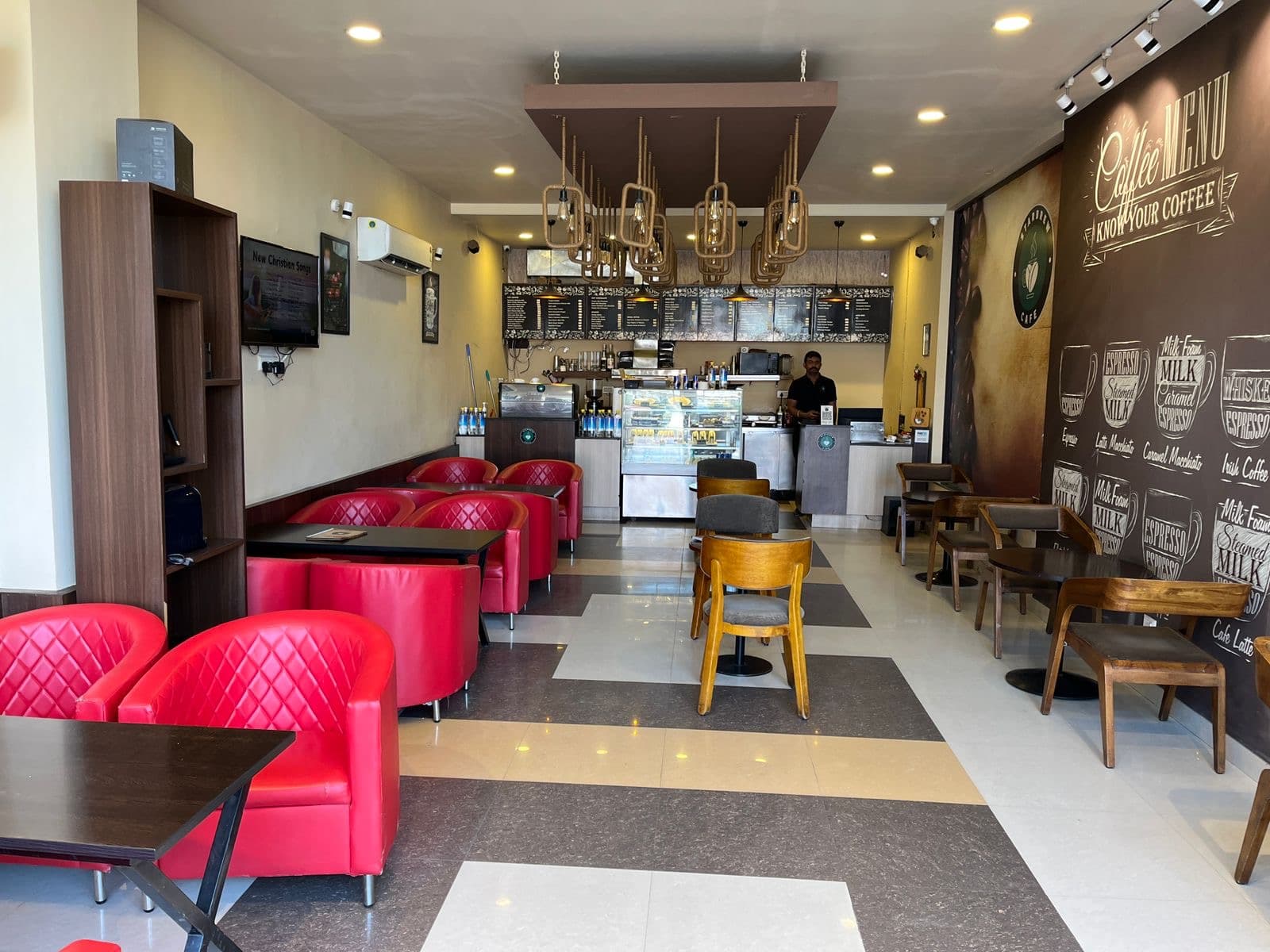 Inside StarBrew Cafe — warm seating area with ambient lighting